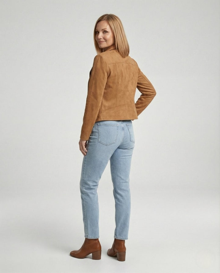 Back view of camel moto jacket showing seam detailing and slim fit
