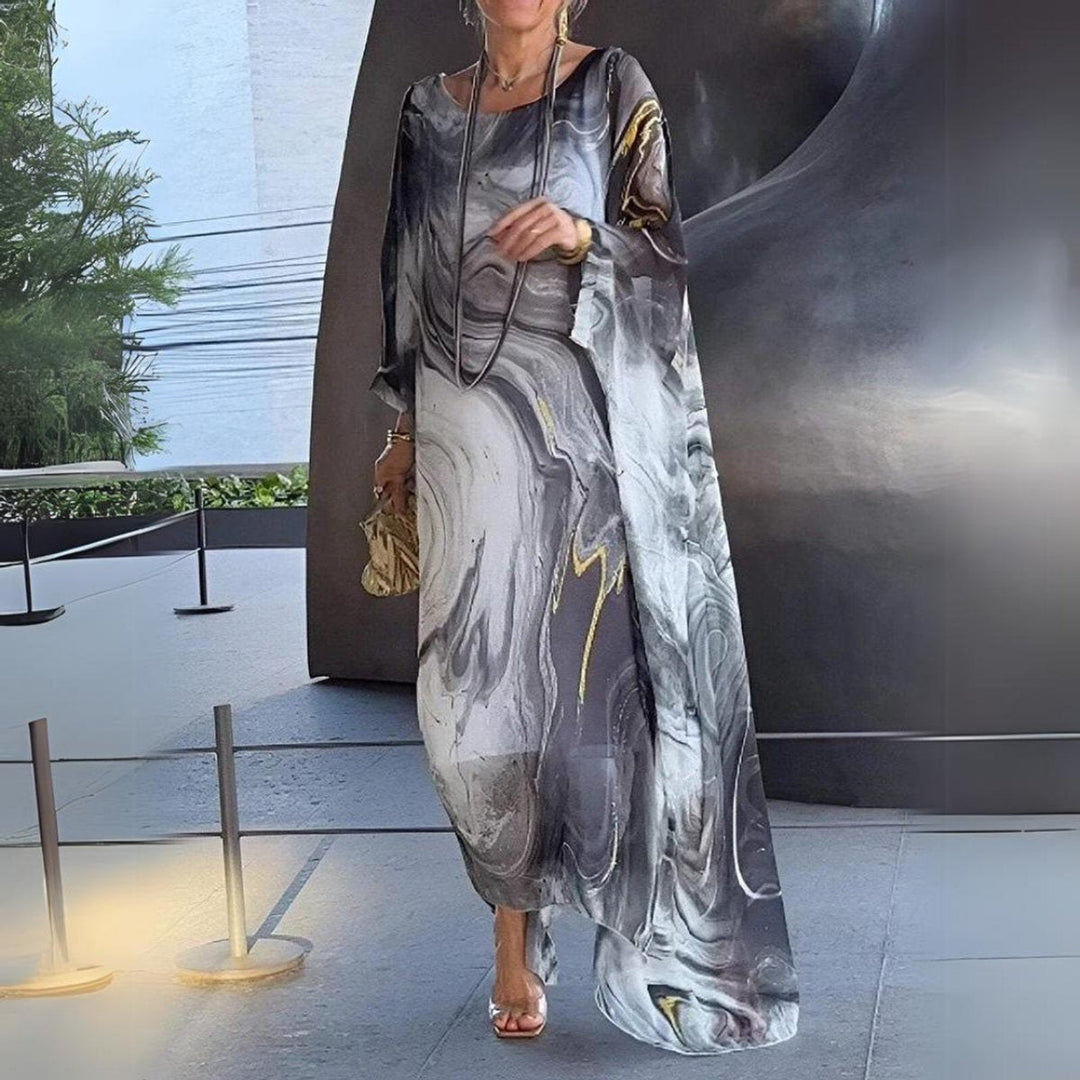 Front view of gray abstract-print kaftan dress with sheer sleeves
