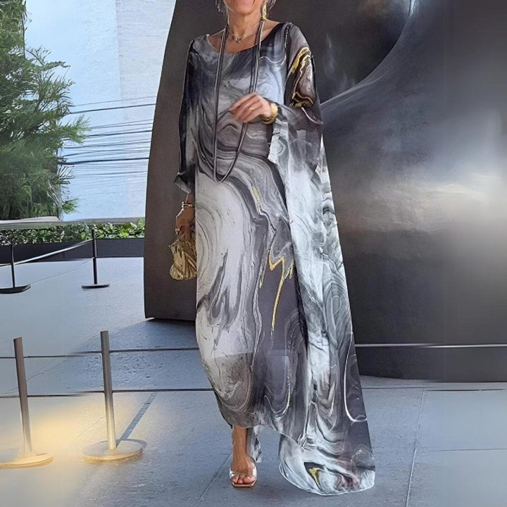 Front view of gray abstract-print kaftan dress with sheer sleeves