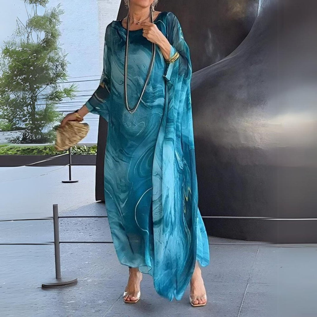 Teal marble-print batwing maxi dress with dramatic flowing sleeves