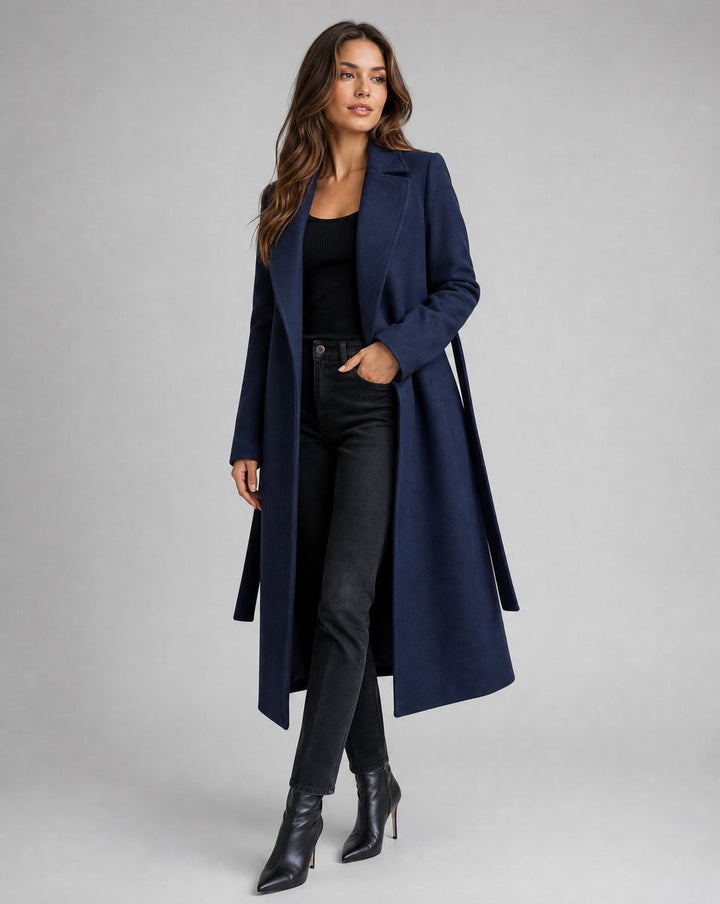 Navy wool-blend trench coat styled with black jeans and ankle boots