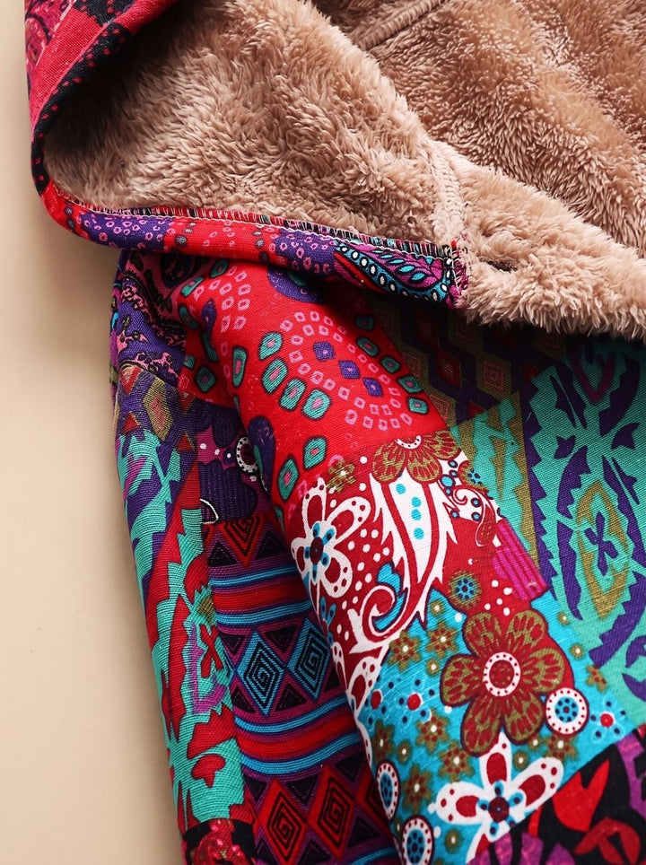close-up of faux fur hood lining on colorful patchwork print jacket