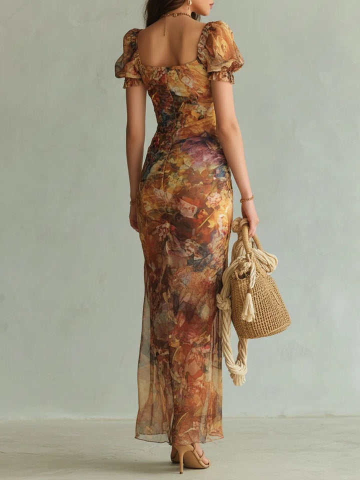 Floral maxi dress showing square-back neckline and puff sleeves, rear view