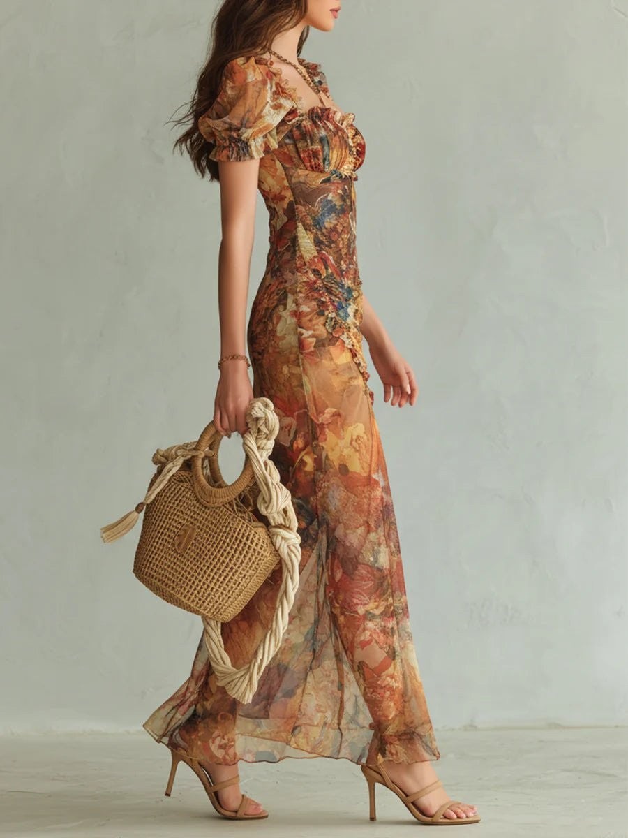 Side profile of floral chiffon maxi dress with front slit and puff sleeves