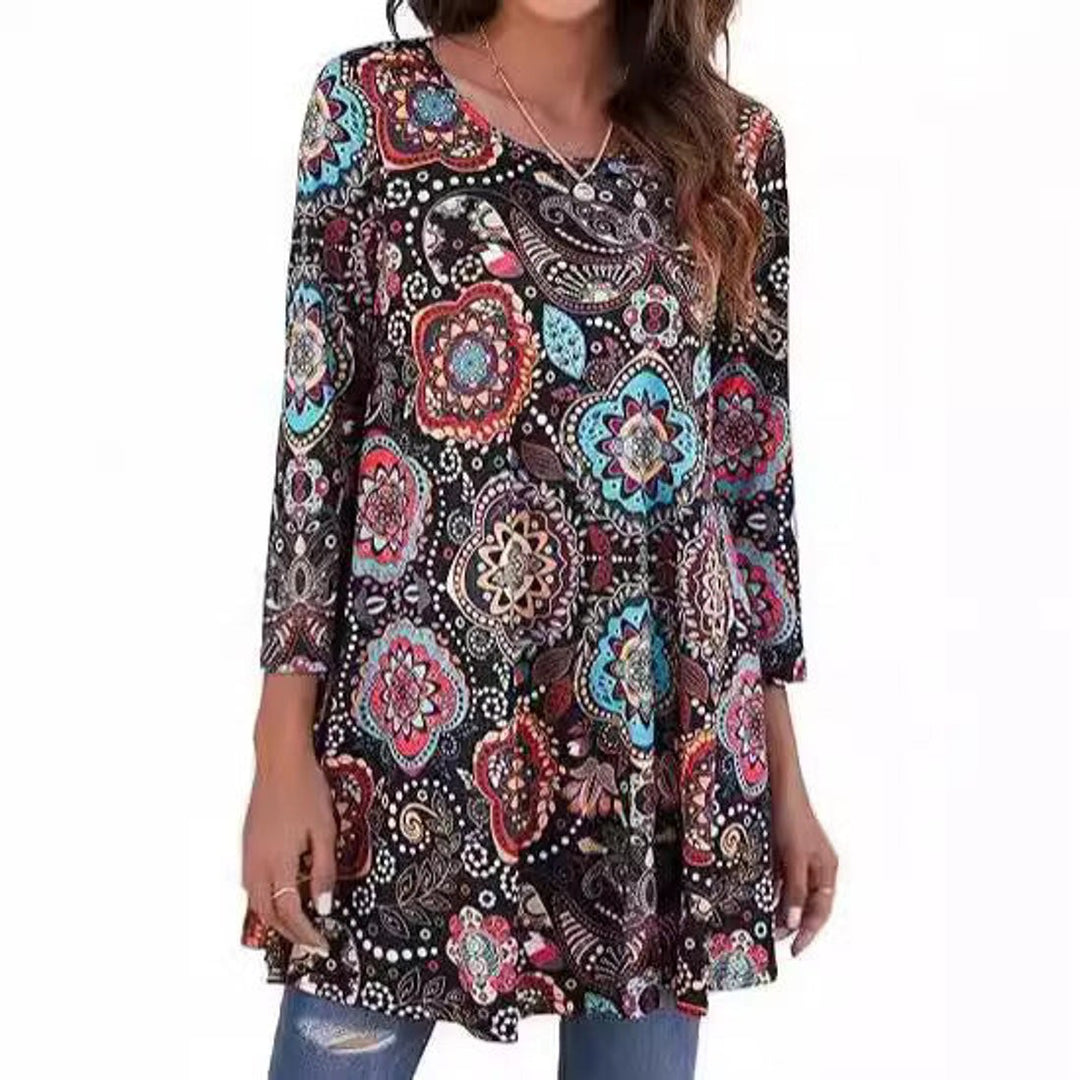 black paisley floral print tunic top with three-quarter sleeves on model