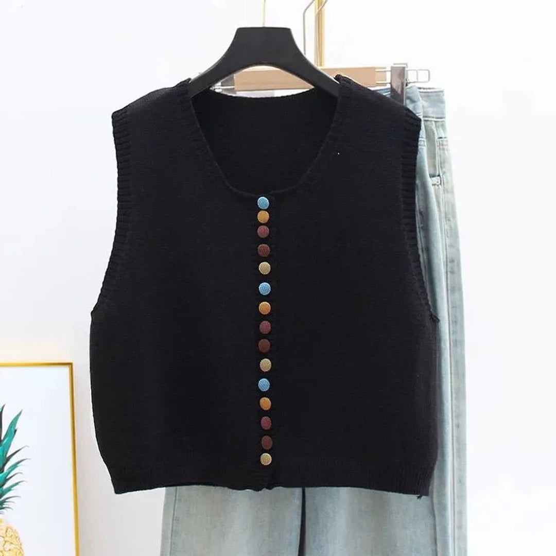 Black knit vest with rainbow button placket, cropped sleeveless style