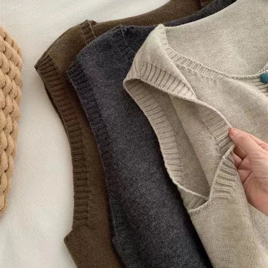 Close-up of ribbed knit vest necklines in brown, gray, and cream