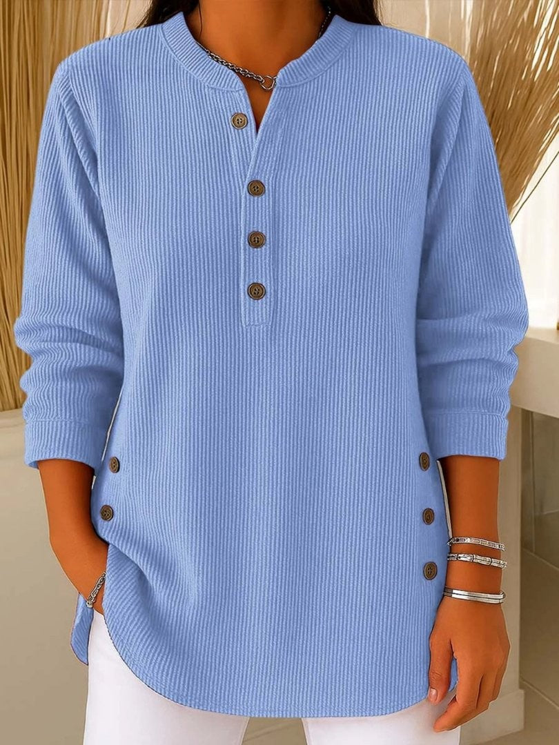 light blue ribbed knit henley top with button-front detail and long sleeves
