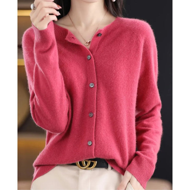 Rose pink button-front cashmere cardigan with round neckline on model