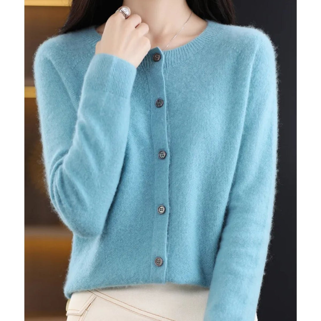 Sky blue knit cardigan sweater with button closure, close-up view