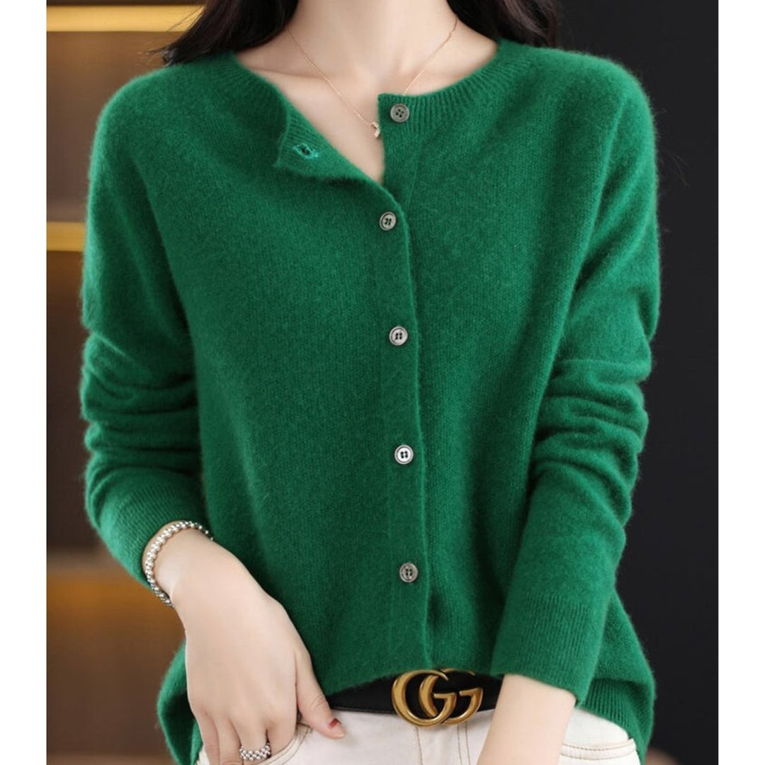 Emerald green knit cardigan sweater with button closure, front view
