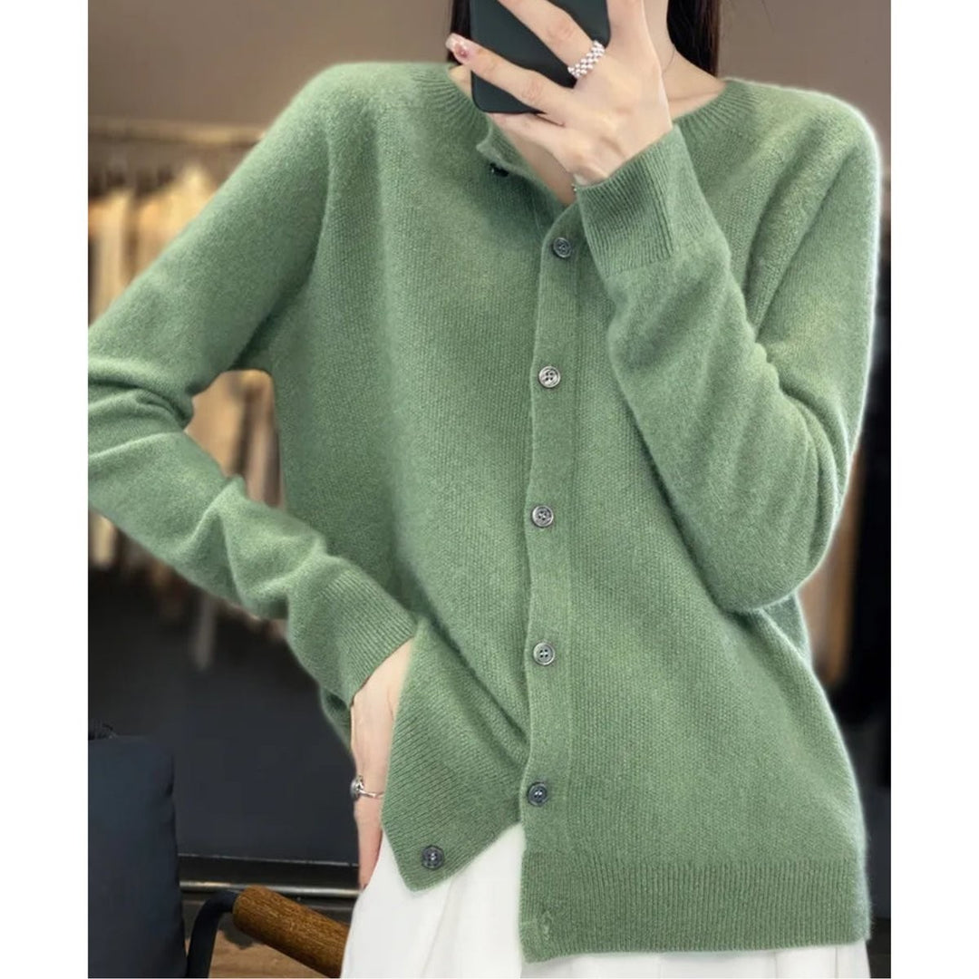 Sage green cashmere cardigan sweater with button front, close-up