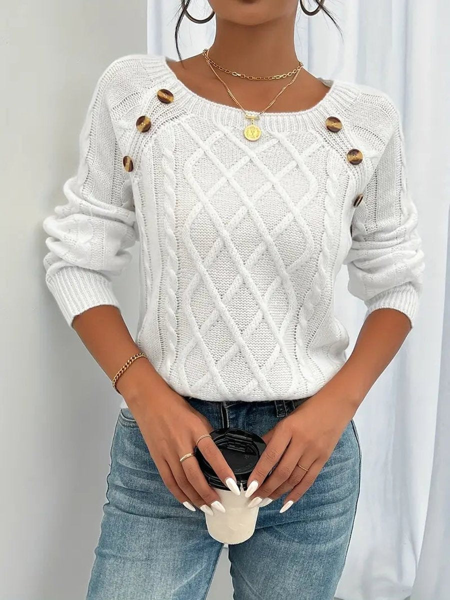 White cable knit sweater with button detail at round neckline