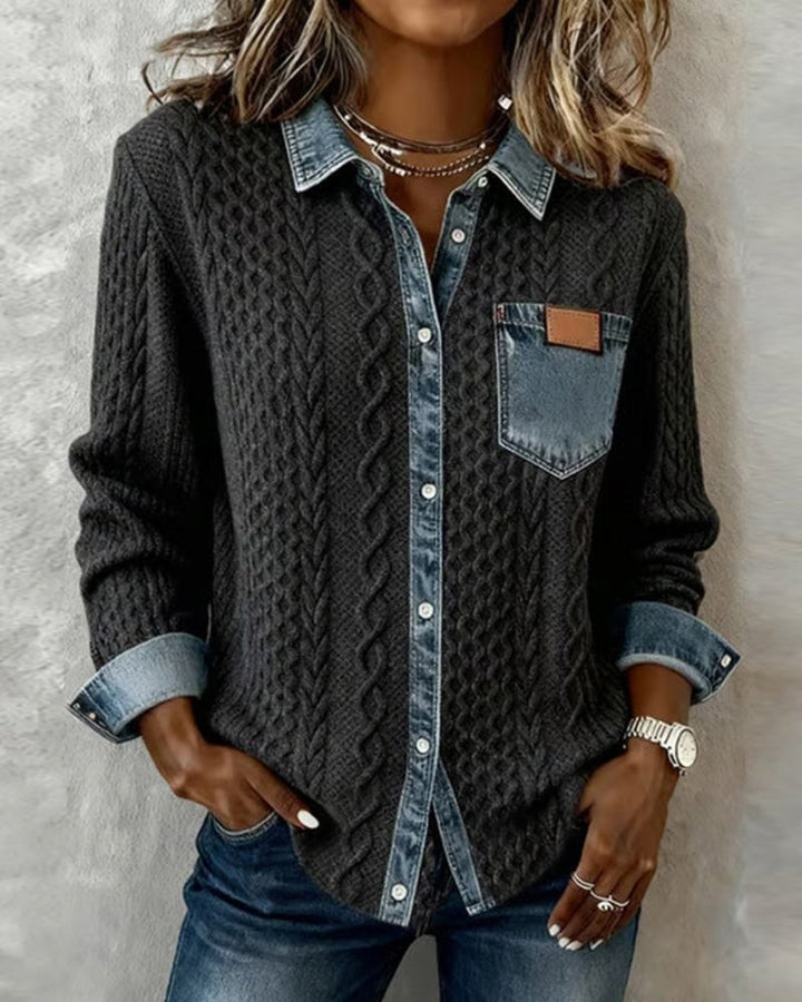 Model wears black cable-knit denim-patchwork button-down shirt with cuffed sleeves