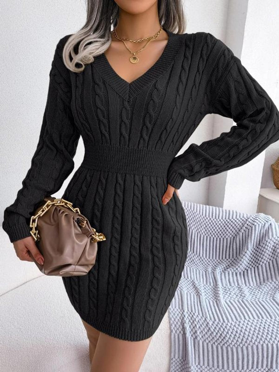 Black cable-knit sweater dress with cinched waist and V-neckline