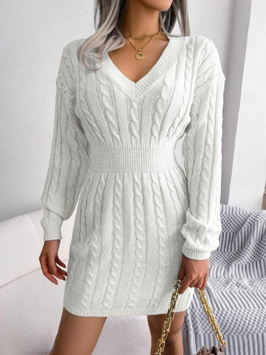 White cable-knit sweater dress featuring V-neck and cinched waist