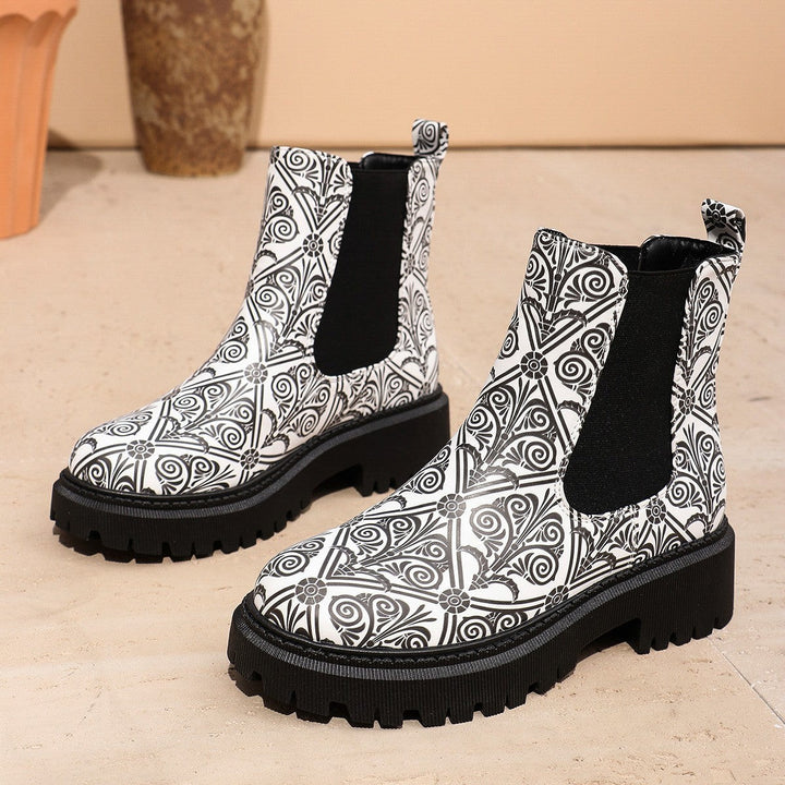 Black and white swirl-print Chelsea boots with chunky lug sole