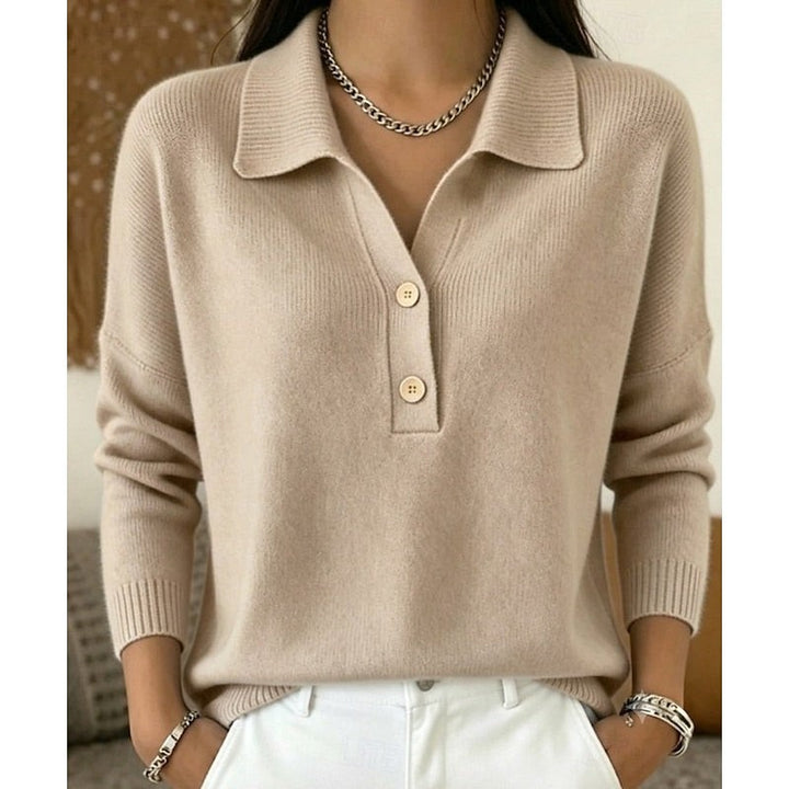 Beige collared button sweater paired with white jeans, ribbed trim detail