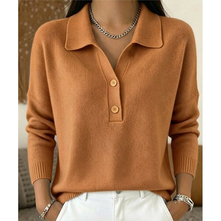 Rust orange knit polo sweater with collared neckline and button placket