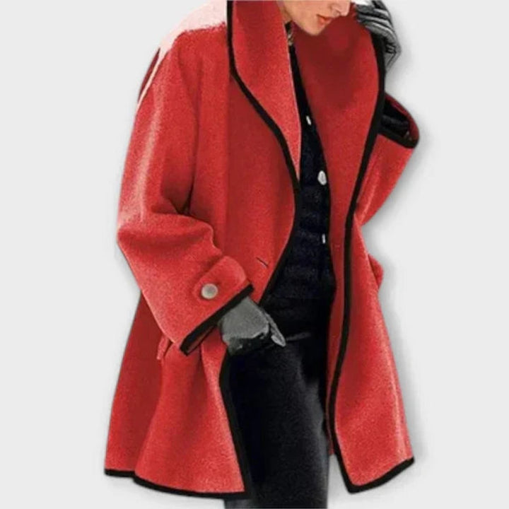 Red wool-blend swing coat with black contrast trim and oversized sleeves