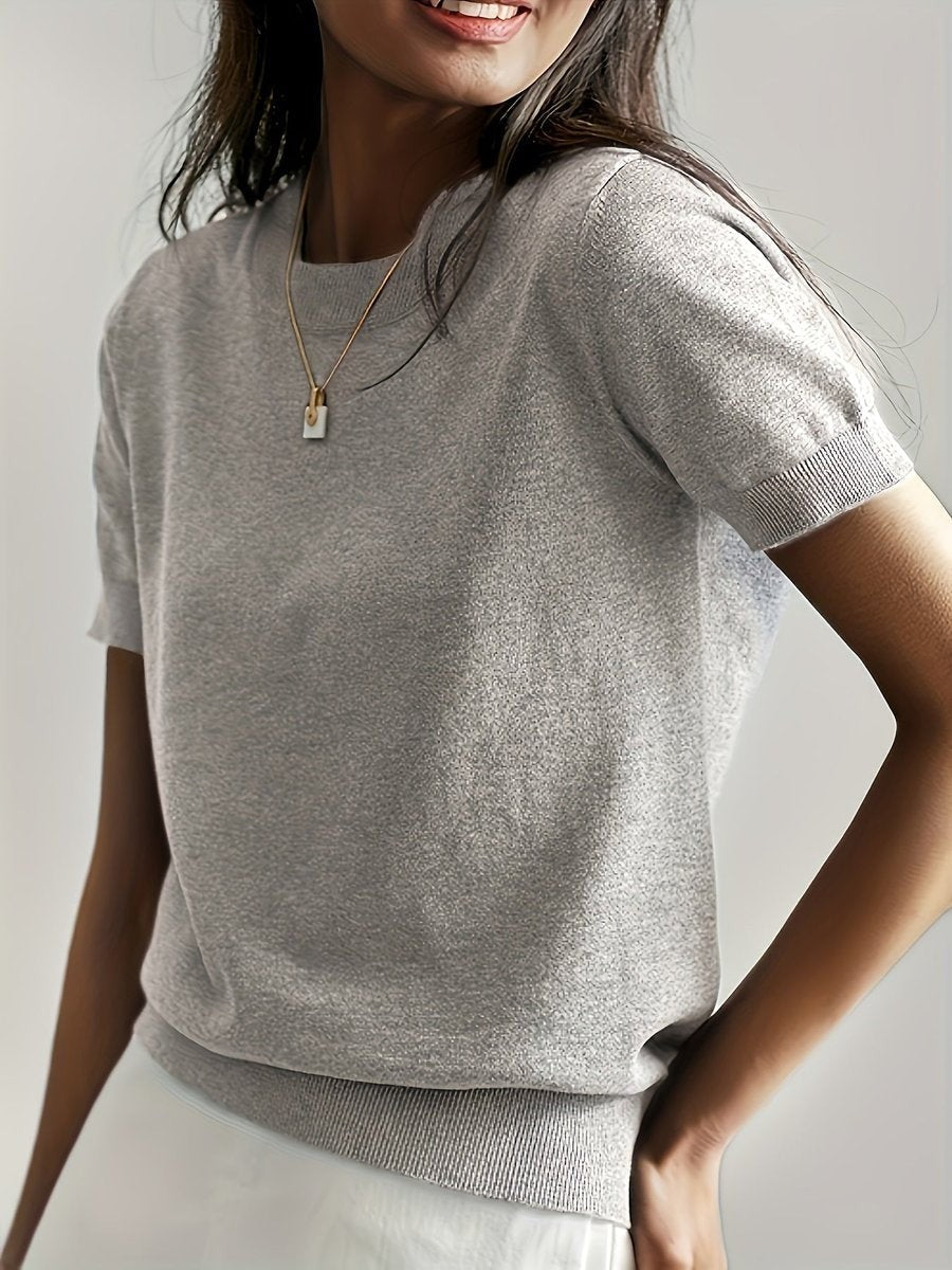 Light gray heathered knit top featuring short sleeves and crew neck