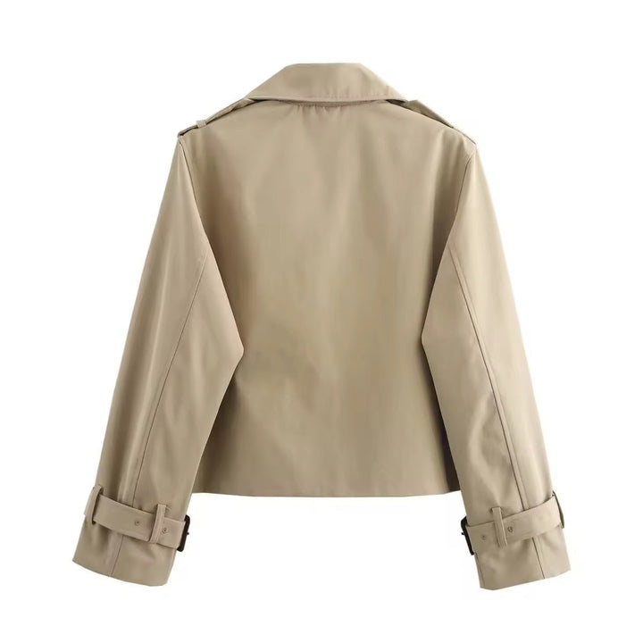 Beige cropped trench jacket back view showing belted cuff detail