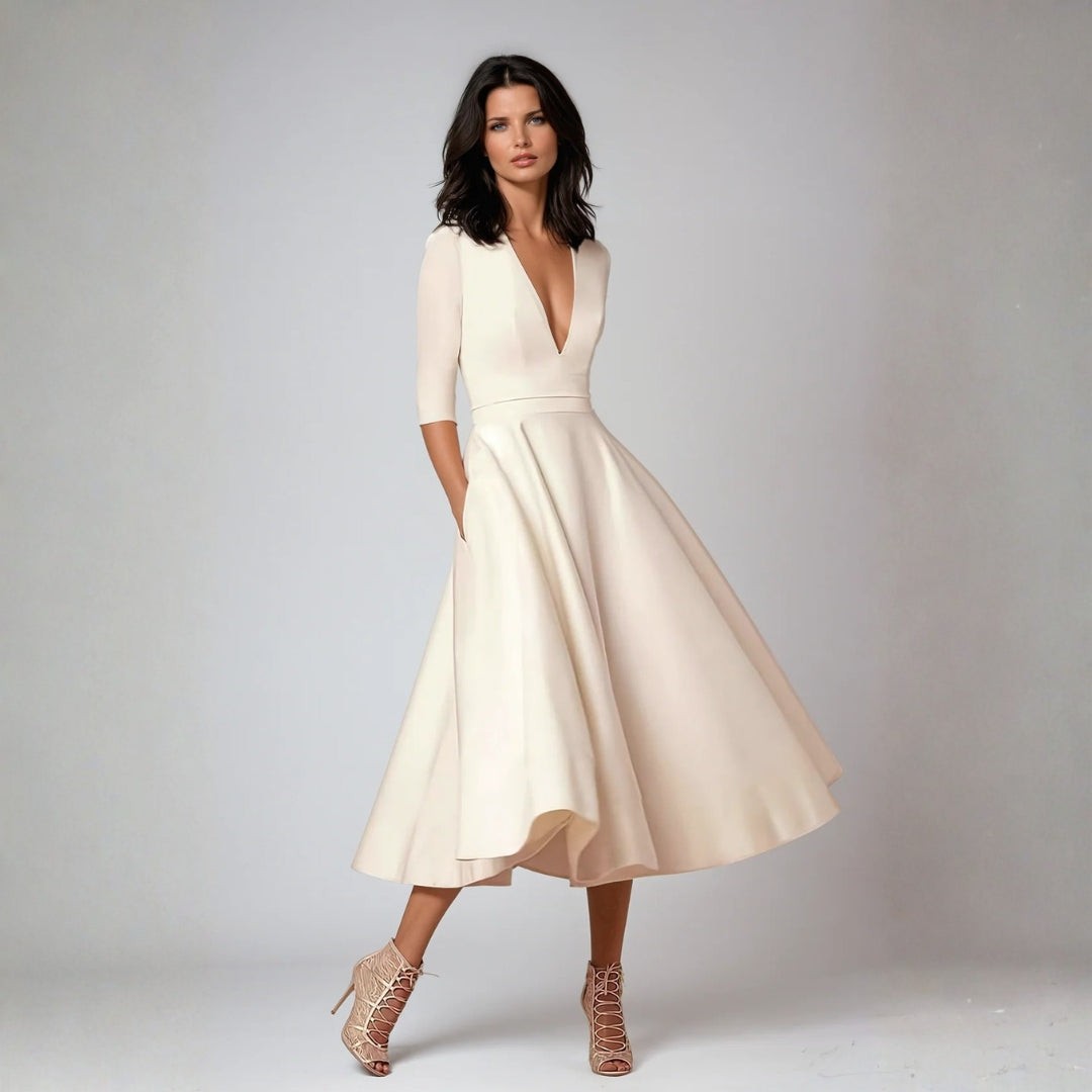 Ivory deep V-neck midi dress with half sleeves and full flared skirt