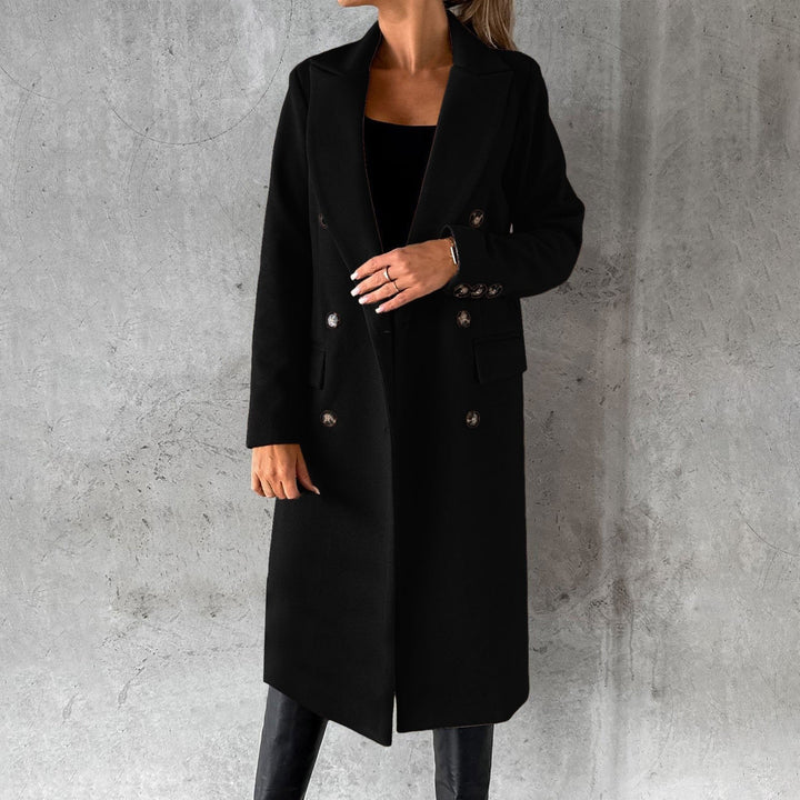 black double-breasted longline coat with structured shoulders and buttons