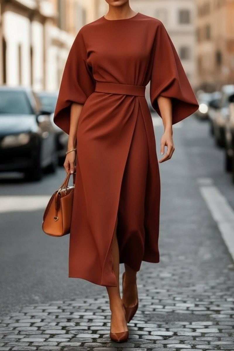 Rust midi dress with cape sleeves and draped wrap belted waist