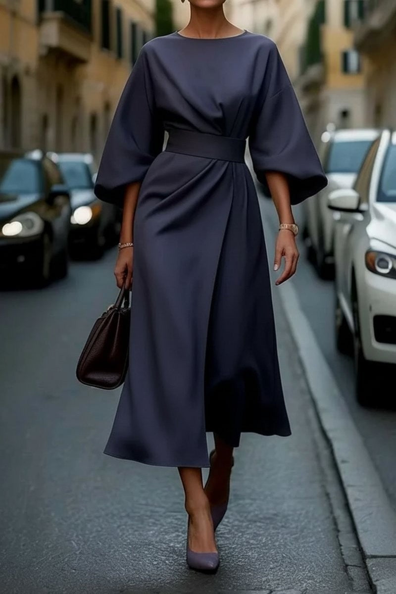 Navy blue belted midi dress with cape sleeves and flowy skirt
