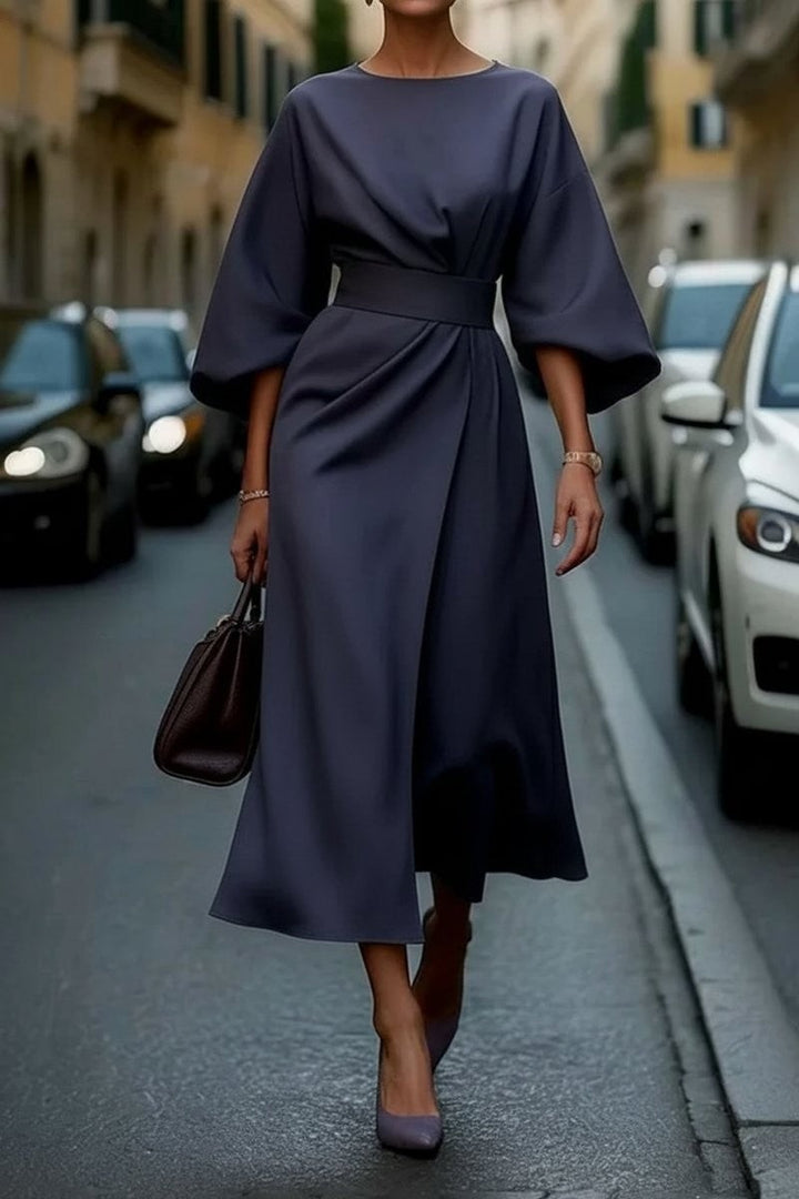 Navy blue belted midi dress with cape sleeves and flowy skirt