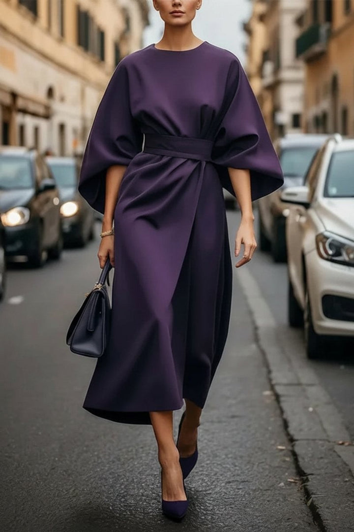 Purple belted midi dress with wide cape sleeves and draped wrap skirt