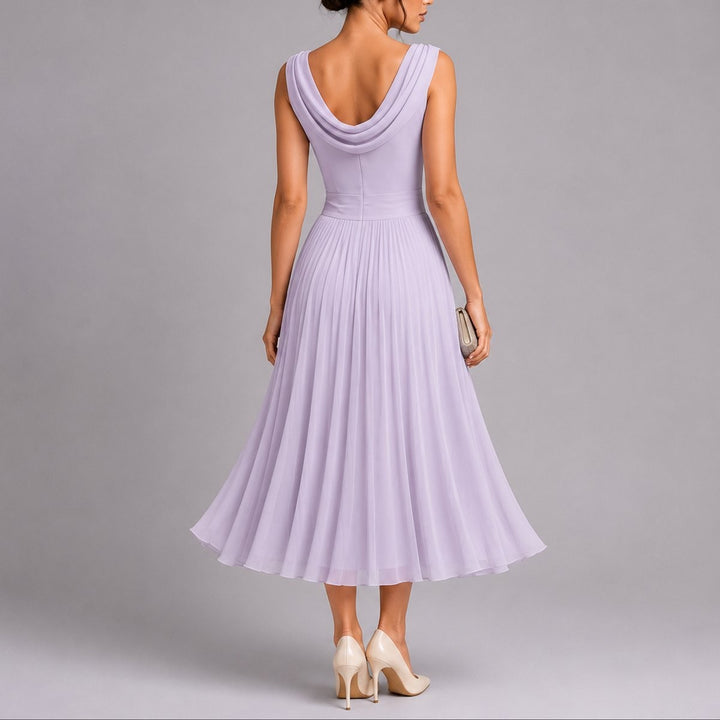 Lavender chiffon midi dress with draped cowl neckline, back view pleated skirt