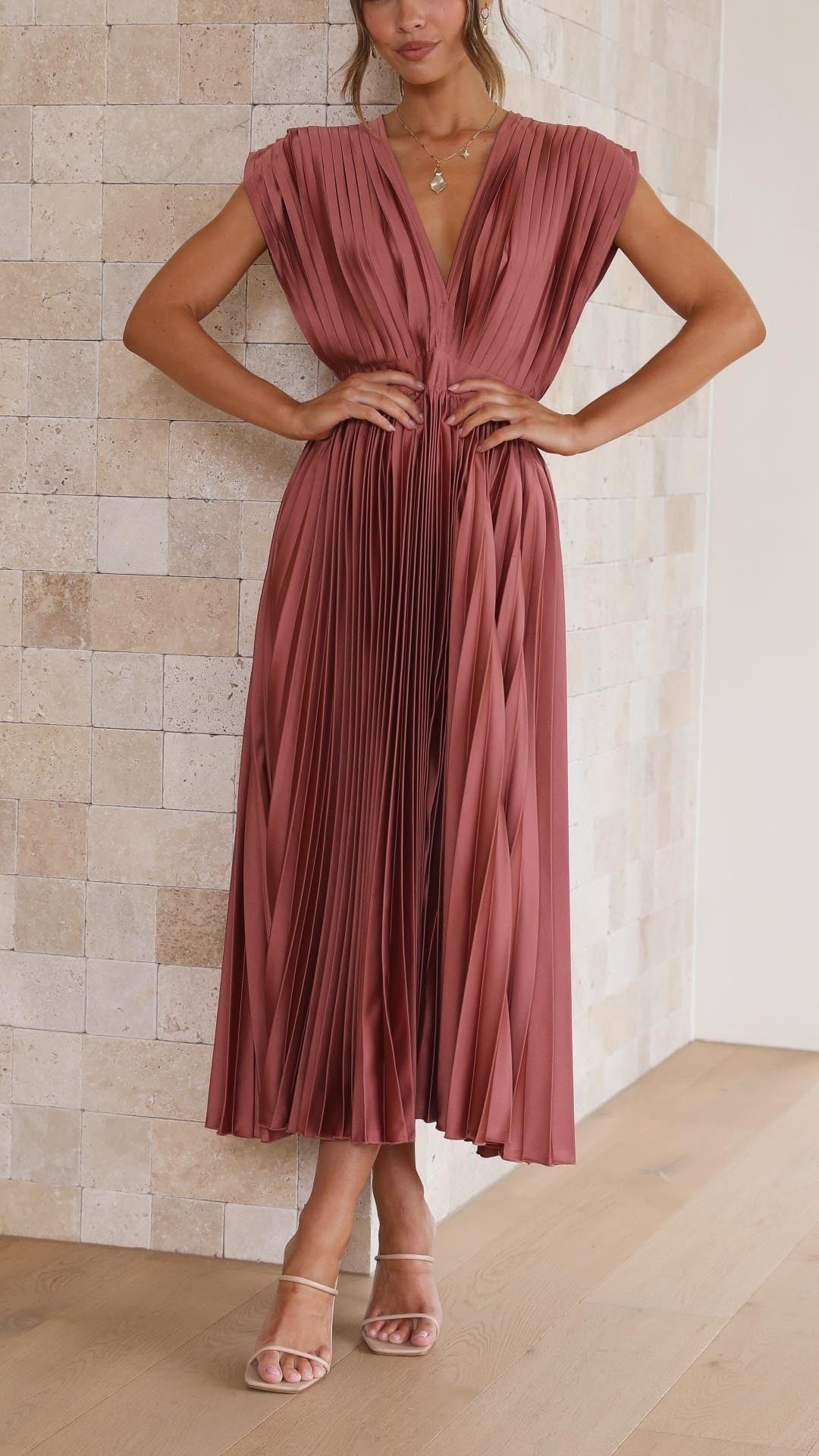 Rust pink pleated satin maxi dress with plunging V-neck and cap sleeves