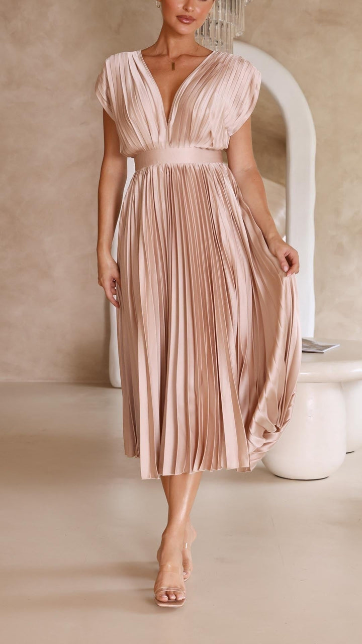 Blush pink pleated satin dress with deep V-neck and cap sleeves