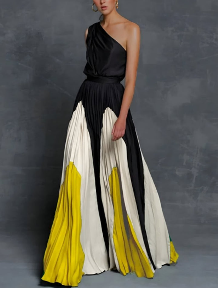 One-shoulder pleated maxi dress with black, ivory, and yellow color-block skirt