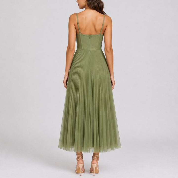 Back view of sage green pleated tulle midi dress with corset bodice