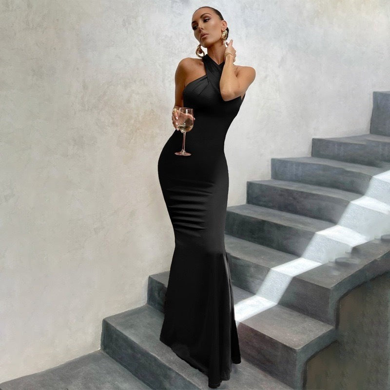 Black criss-cross halter fishtail maxi dress with fitted silhouette