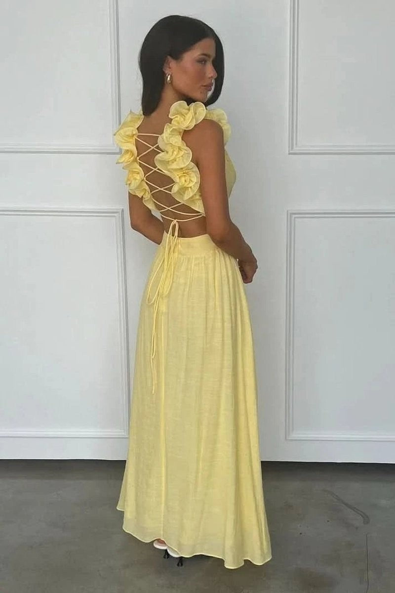 back view of yellow maxi dress with lace-up open back and ruffled straps