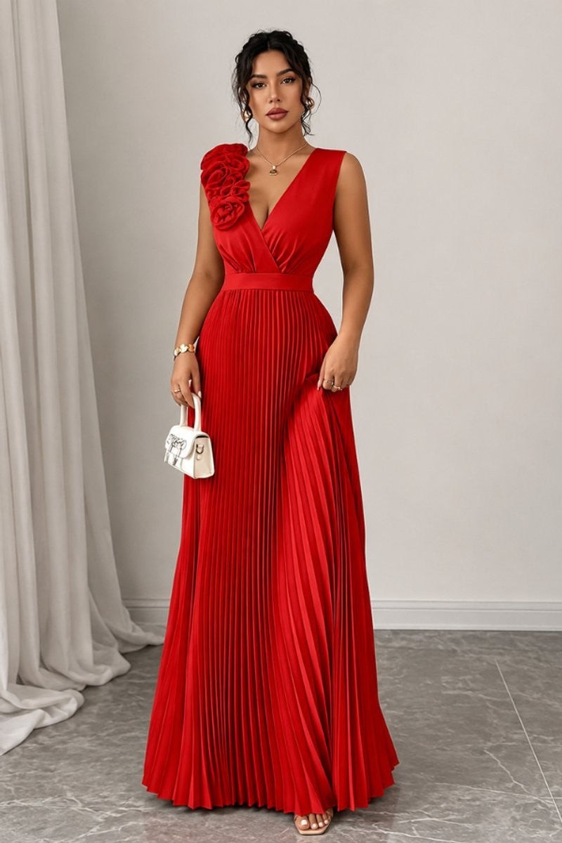 red pleated maxi dress featuring floral shoulder accent and deep V-neckline