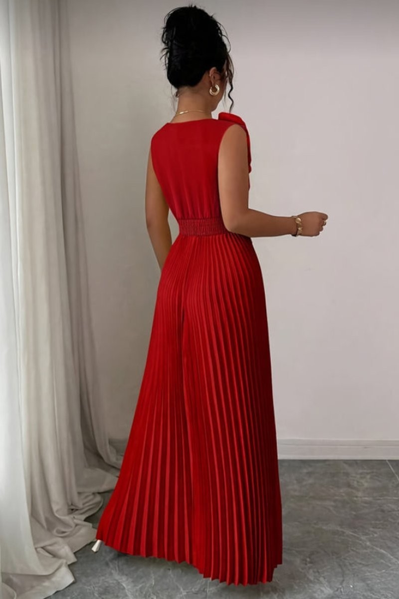 back view of red sleeveless maxi dress with pleated skirt and fitted waist