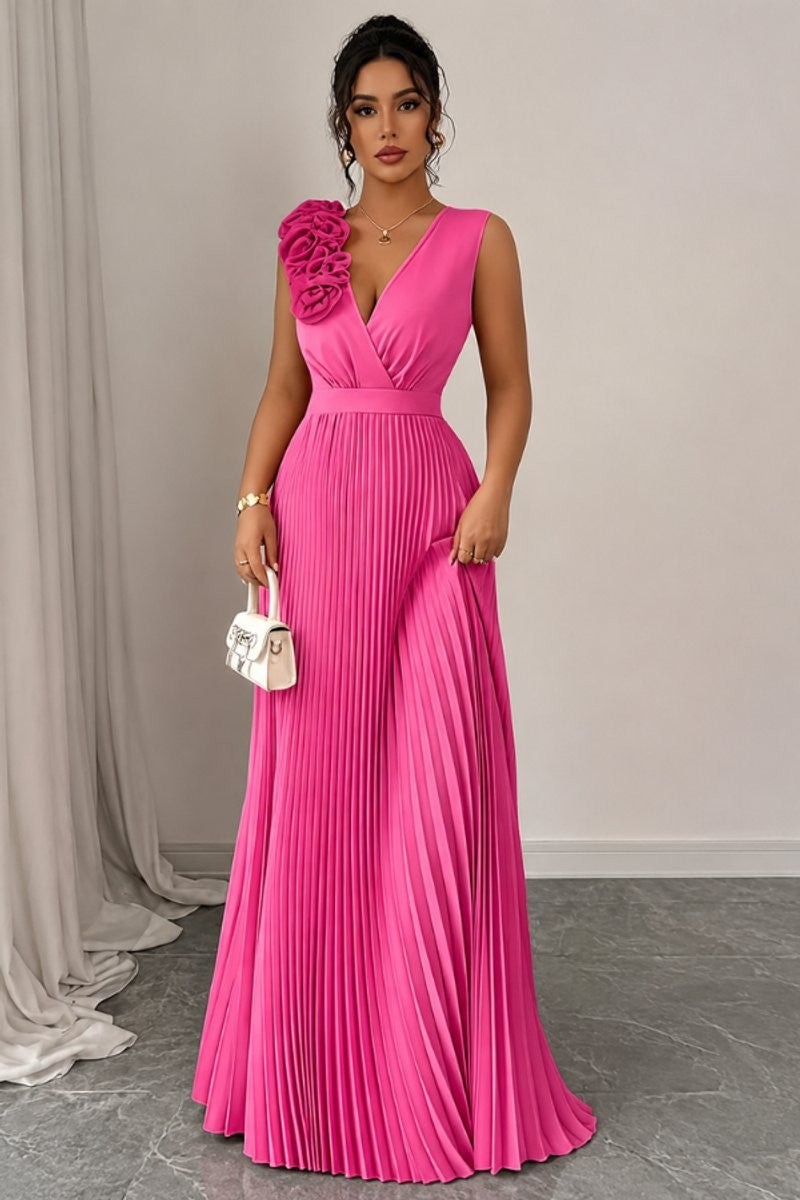 hot pink pleated maxi dress with rosette shoulder detail and V-neck bodice
