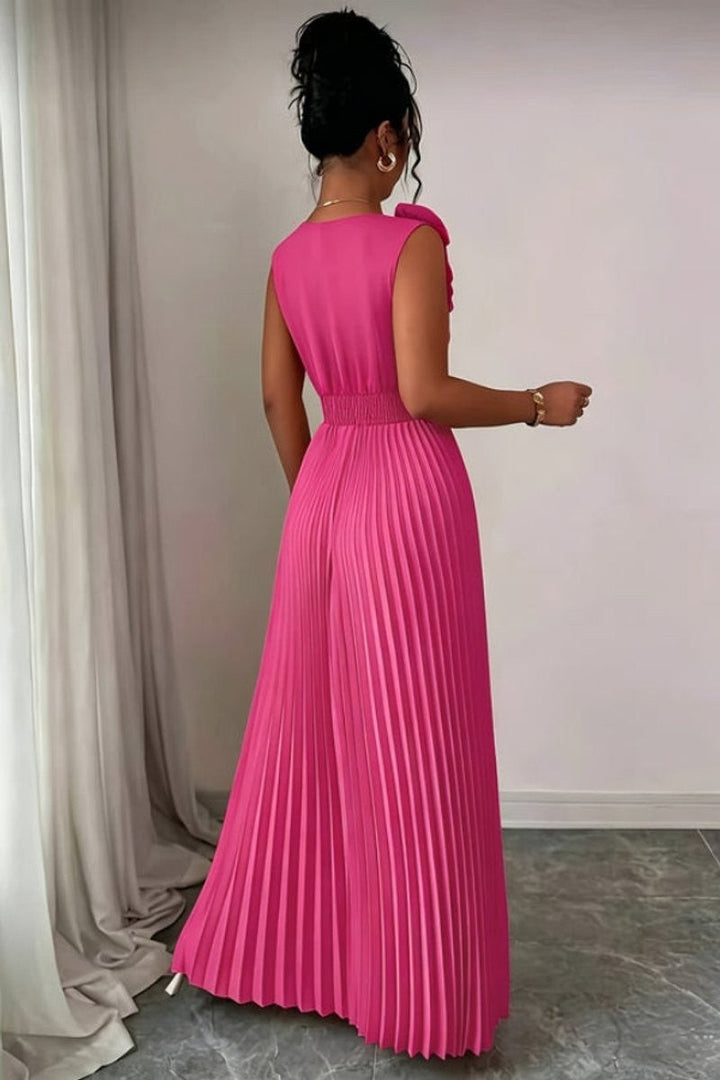 back view of hot pink sleeveless maxi dress with pleated A-line skirt