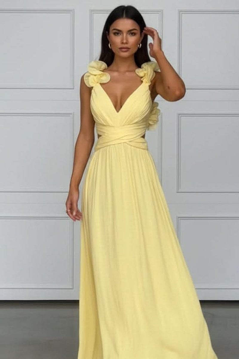 pale yellow maxi dress with ruffled straps and wrapped cutout waist