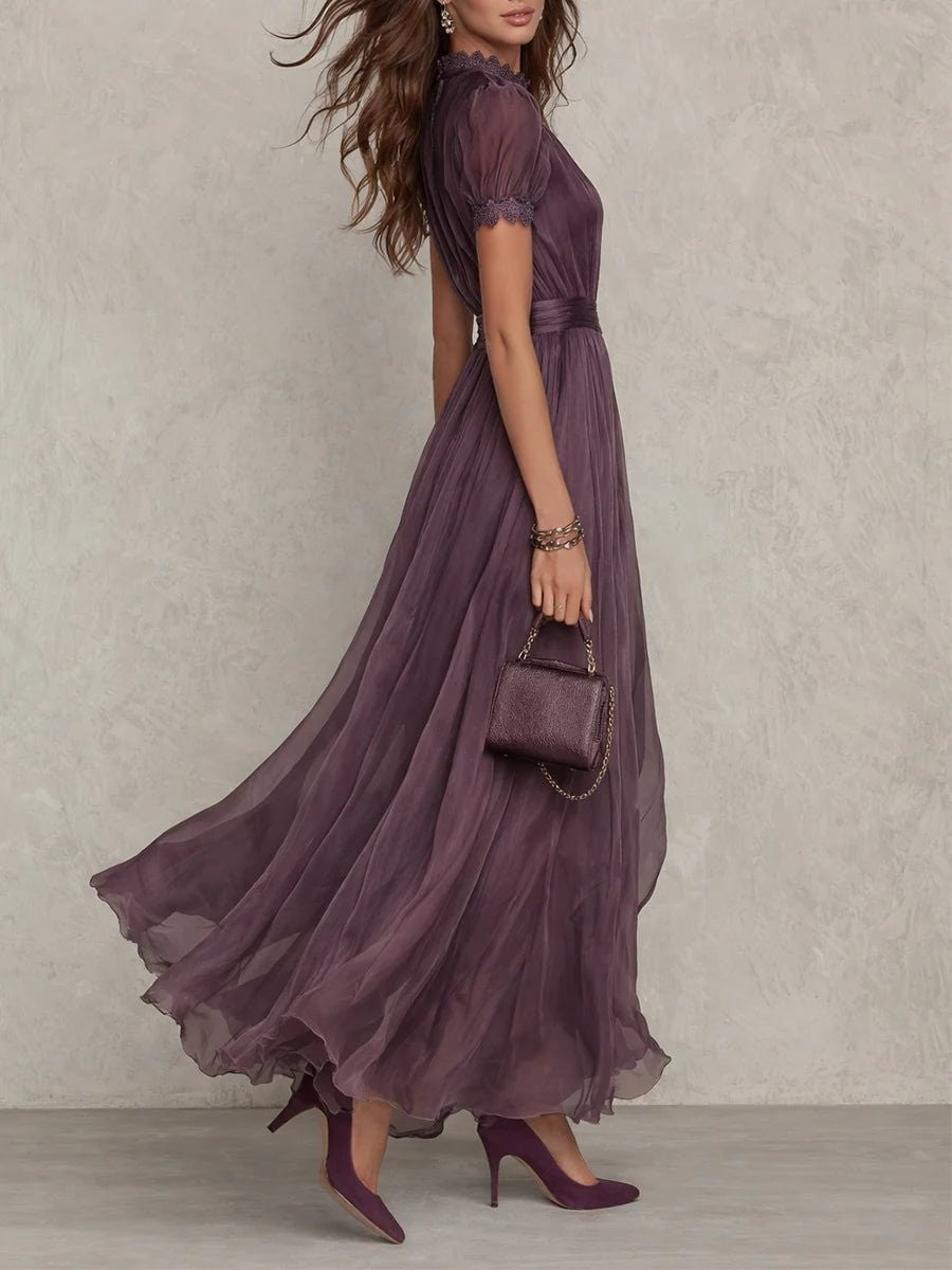side view of flowing purple maxi dress with lace trim puff sleeves