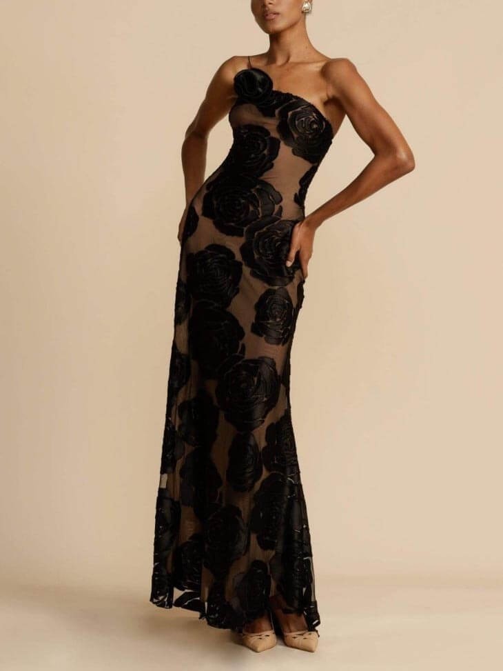 sheer floral maxi dress in black with one-shoulder rosette neckline