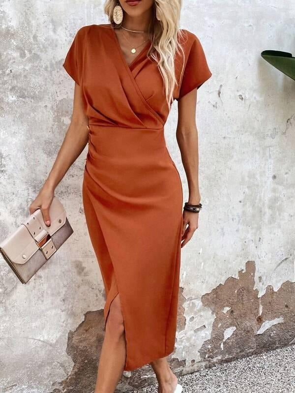 burnt orange V-neck midi dress featuring ruched side and front slit