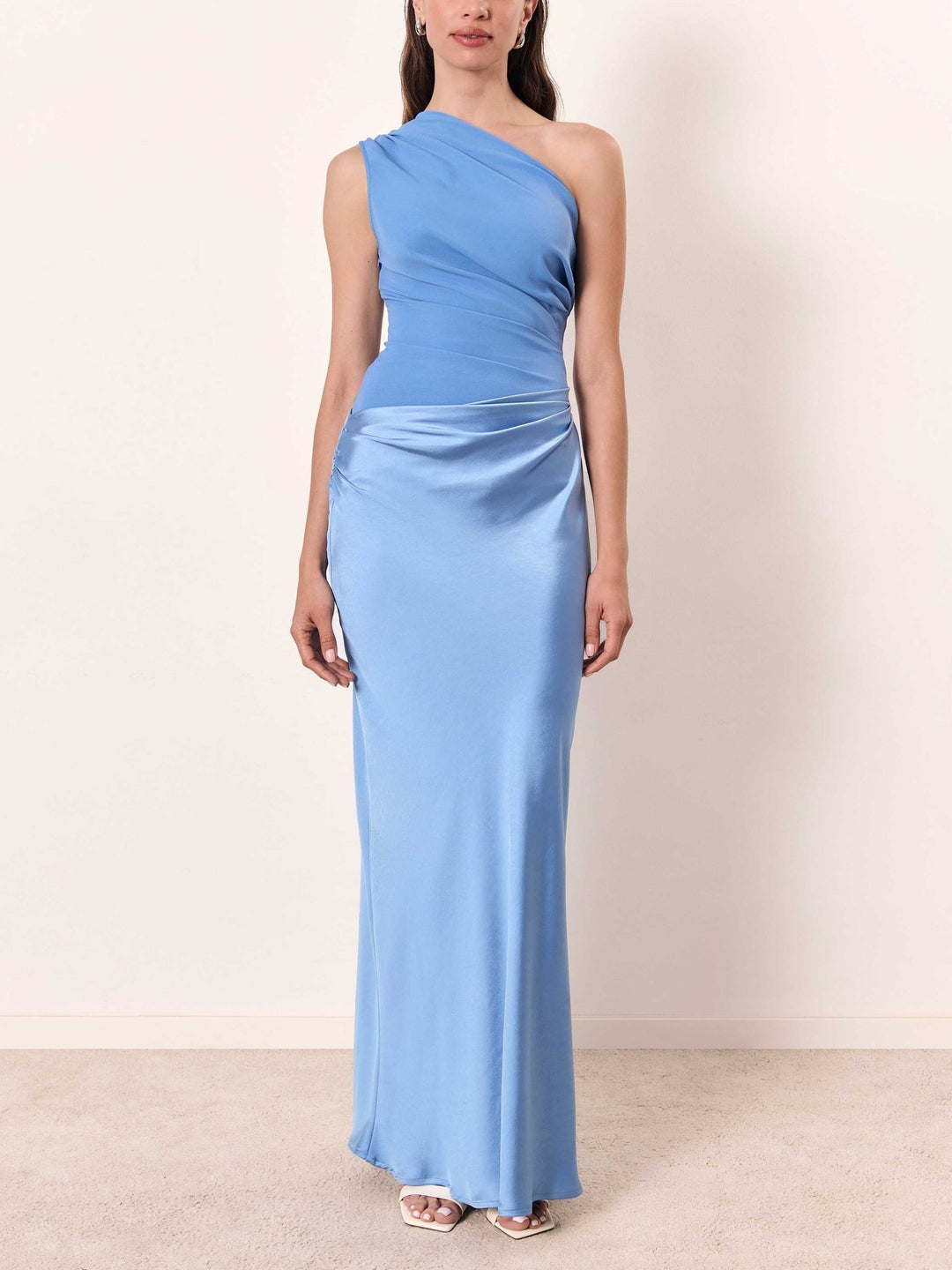 olive satin one-shoulder maxi dress styled with nude strappy heels