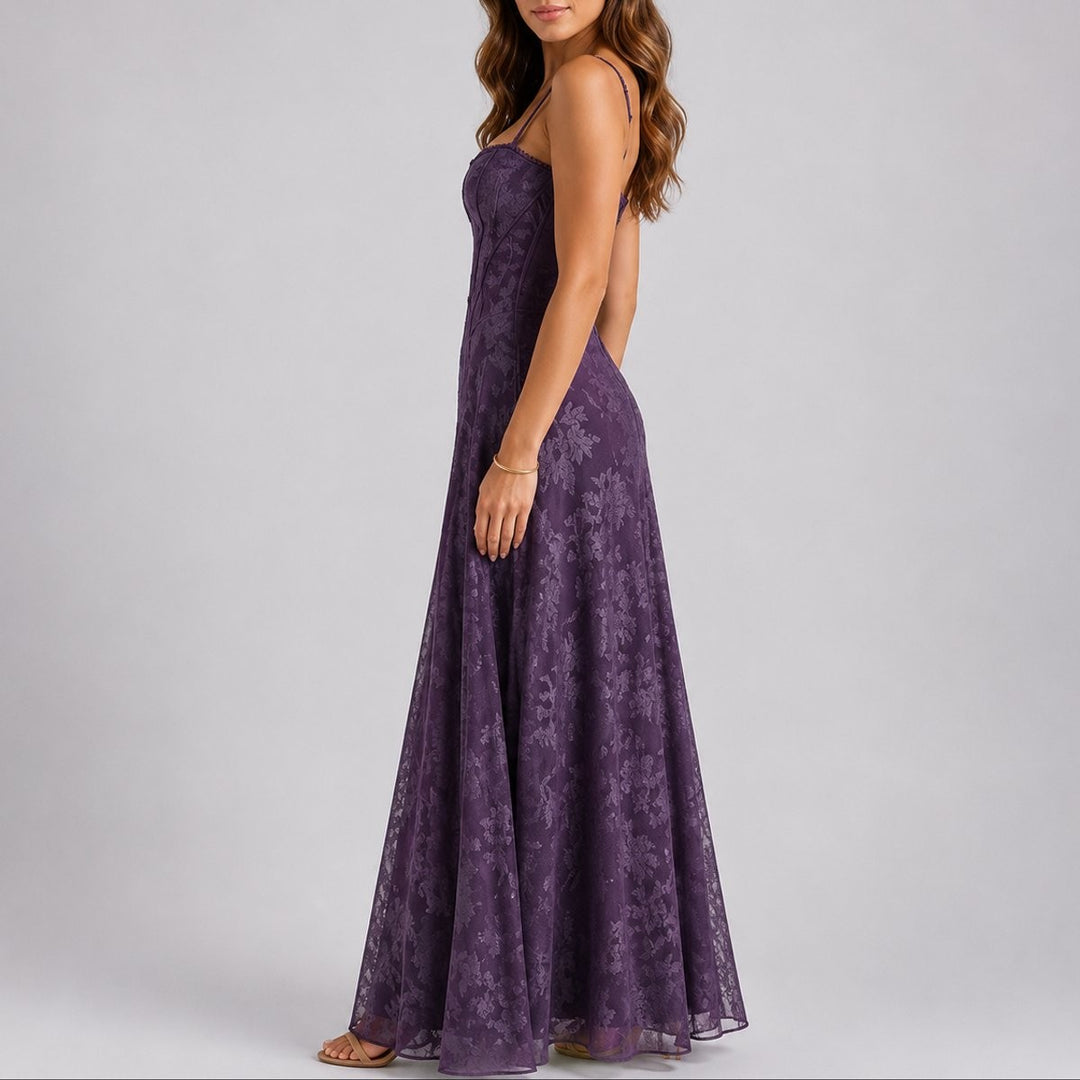 Side view of purple lace corset maxi dress with flowing A-line hem