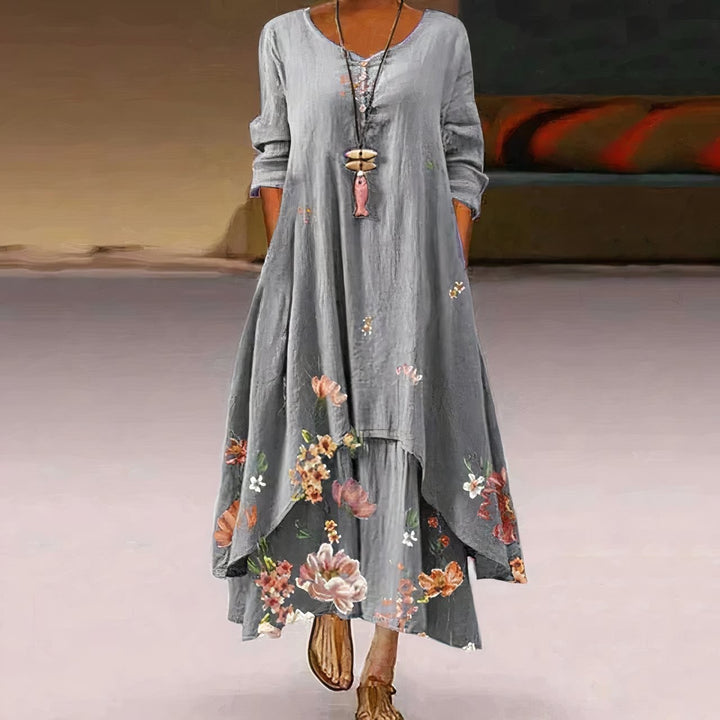 gray tiered maxi dress featuring floral print at hem